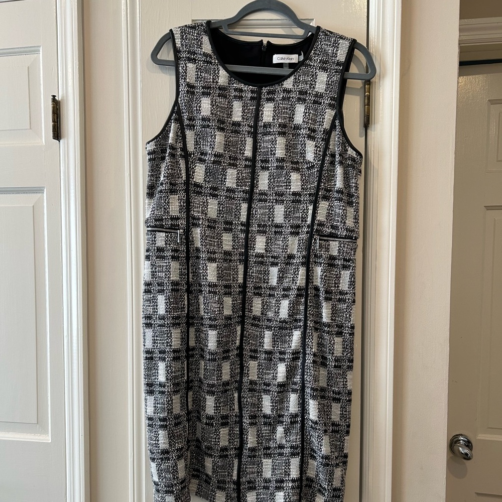 Calvin Klein sheath dress.  Faux leather trim detail.  Size 12.  Has pockets 😀
